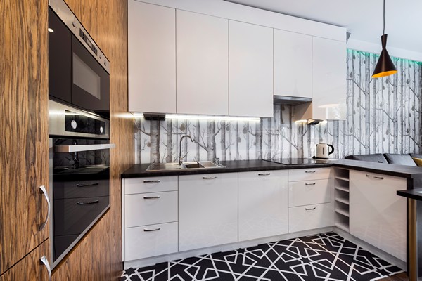 Modern kitchen interior design with white cupboards